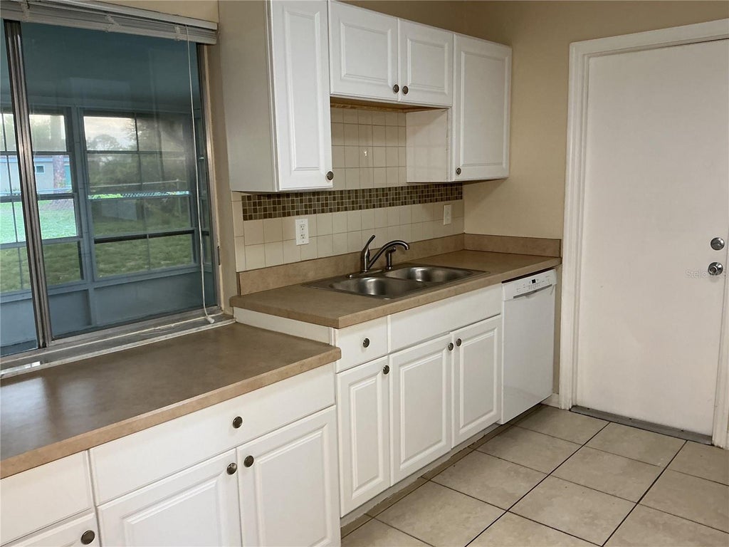 Photo of 3328 Nekoosa Street, North Port, FL 34287 (MLS # TB8518957)