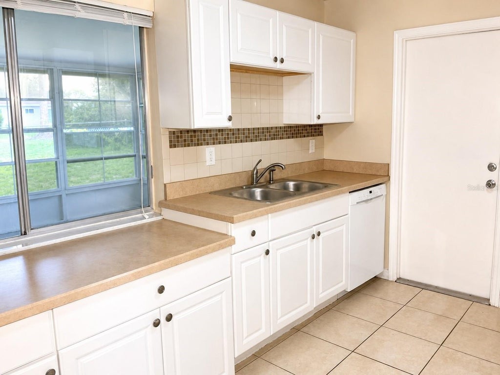 Photo of 3328 Nekoosa Street, North Port, FL 34287 (MLS # TB8518957)