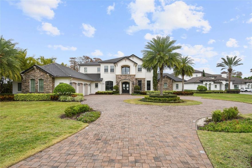 Nestled within the highly sought-after community of Waterstone in Windermere, this prime nearly 3-acre property presents a rare opportunity to own a spectacularly remodeled 6-bedroom residence on Lake Butler and the beautiful chain of lakes.

This home is a masterpiece of design and craftsmanship, boasting breathtaking waterfront views. The expansive backyard, spanning over 2 acres, features a private boat dock equipped with two covered boat lifts and a double jet ski lift, offering direct access to serene lake adventures.

As a resident of this gated community, you'll enjoy exclusive access to Windermere Prep School, enhancing the allure of this sought after location. The resort-style pool area is a haven for relaxation and entertainment, complete with an outdoor summer kitchen, elegant fire elements, and a stunning loggia with retractable screens, perfect for enjoying Florida's beautiful weather.

The interior of the home is just as impressive as its exterior. The ground floor hosts the luxurious master bedroom, a welcoming guest bedroom, a spacious great room, covered lanai, office, formal dining room, and a convenient laundry room. Each space is designed with elegance and comfort in mind, offering serene water views.

Upstairs, you'll find a large second family room/loft, an immersive media room, and four additional well-appointed bedrooms, providing ample space for family and guests. The home is adorned with beautiful French oak floors and brand-new carpeting in the bedrooms, creating a warm and inviting atmosphere.

The heart of the home is the breath taking kitchen, which opens to the covered porch and summer kitchen. In addition, the master bedroom and bathroom, are all designed to maximize the stunning water views. Almost every room in this exquisite home offers a view of the tranquil Lake Butler, making it a true waterfront paradise.

This property is more than just a home; it's a lifestyle, offering luxury, comfort, and unparalleled lakefront living in one of Windermere's most desirable communities. Don't miss the chance to experience this incredible home and all it has to offer. 

<iframe width="560" height="315" src="https://www.youtube.com/embed/bd7l1pn_QY4?si=x-p90iclq6sNPu5V" title="YouTube video player" frameborder="0" allow="accelerometer; autoplay; clipboard-write; encrypted-media; gyroscope; picture-in-picture; web-share" allowfullscreen></iframe>