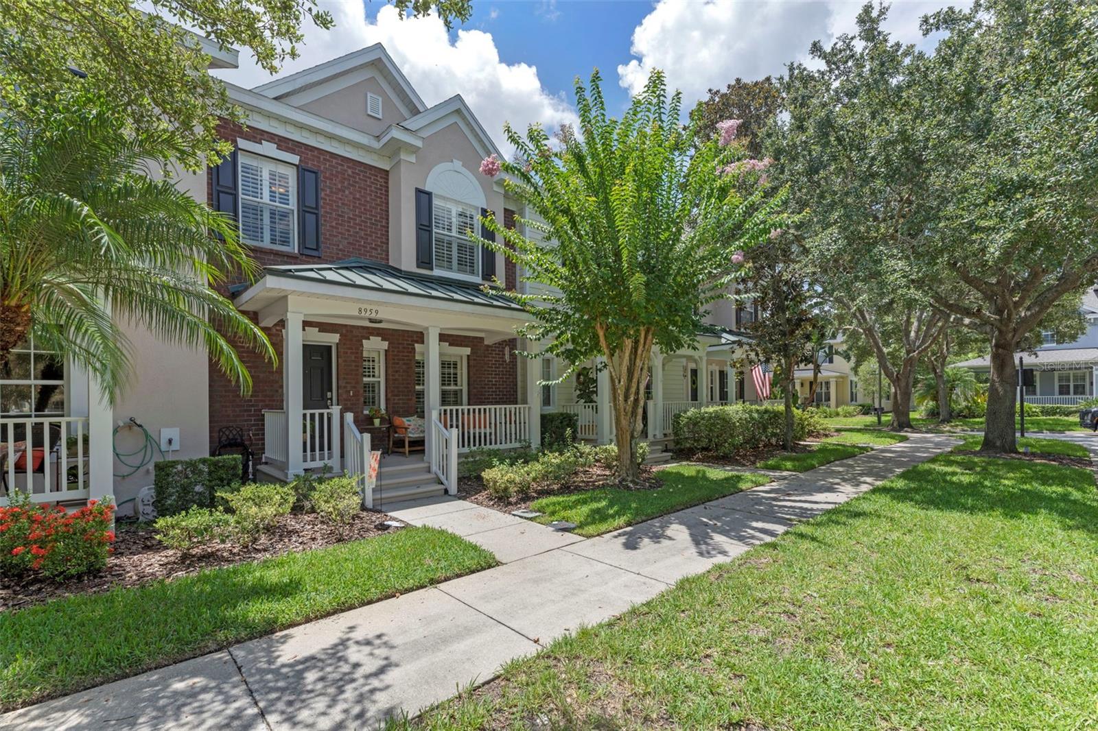 Parkfront Setting | Maintenance-Free Living | Move-In Ready |
Located in Lake Nona’s Northlake Park, this upgraded townhome offers a spacious layout and park views. The open main level features tile flooring, and great natural light. The kitchen includes modern two-tone 42" cabinetry and granite countertops, while the living area has a built-in entertainment center and space for a baby grand piano.
Upstairs, the primary suite features an upgraded en suite bath with a walk-in closet complete with built-ins. Additional highlights include downstairs finished laundry room, attached 2-car garage, a screened in rear lanai, and a covered front porch facing the park. Recent upgrades include a fresh coat of exterior paint and a new roof.
Northlake Park offers both connectivity and community. HOA dues include Lake Nona YMCA Family Center membership and access to seasonal events, gatherings, and park activities. With tree-lined streets, mature oaks, and close proximity to Medical City, major highways, the airport, and more, this home offers comfort in a highly connected setting.