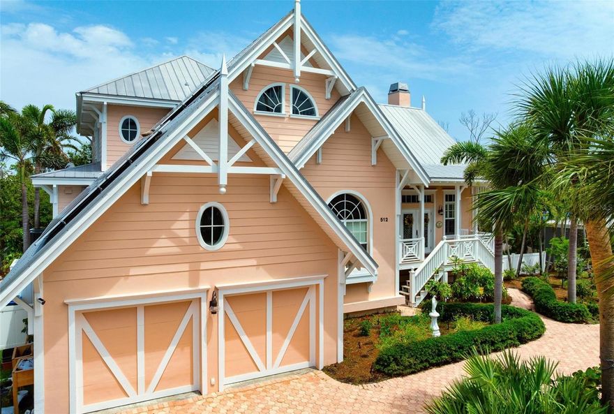 It is time to make Anna Maria Island your own with a rare opportunity to own a truly iconic private island residence in Holmes Beach. Designed by celebrated architect Emily-Anne Smith, this distinctive home is recognized for its signature pink exterior, architectural integrity, and enduring coastal character.

Set along a deep-water canal with direct access through Bimini Bay to Tampa Bay, the property offers seamless access to Florida waters for boating, sailing, and fishing. The setting feels intentionally residential and private, ideal for those seeking a refined second home or a full-time island residence designed for personal enjoyment rather than rental use.

Offering nearly 2,800 square feet of interior living space and an additional 1,000 square feet under roof, the home provides generous proportions and thoughtful separation of spaces. A spacious screened porch overlooks protected mangroves, creating a naturally private backdrop and a peaceful connection to the island environment.

Inside, soaring cathedral ceilings, custom millwork, and a classic Craftsman-style fireplace highlight the quality and intention behind the original design. The chef’s kitchen is outfitted with a 6-burner WOLF range, SUB-ZERO refrigerator, BOSCH dishwasher, granite countertops, and a vegetable sink, offering a well-appointed foundation for both everyday living and entertaining.

The upper level features a versatile loft that includes a bedroom with ensuite bath, a recreation or lounge area, and a charming hidden treehouse retreat, adding character and flexibility to the home’s layout. The floor plan, construction quality, and architectural details provide an exceptional opportunity for a new owner to thoughtfully tailor the space to their own taste while preserving its timeless coastal appeal.

With its architectural pedigree, deep-water boating access, and quiet residential setting, this home invites a new owner to build upon its legacy and create a personalized island retreat that will endure for years to come. Schedule your private showing and experience the setting, serenity, and potential that make this a truly special Florida retreat.