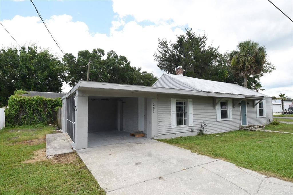 Photo of 201 E Palm Street, Bunnell, FL 32110 (MLS # FC319084)