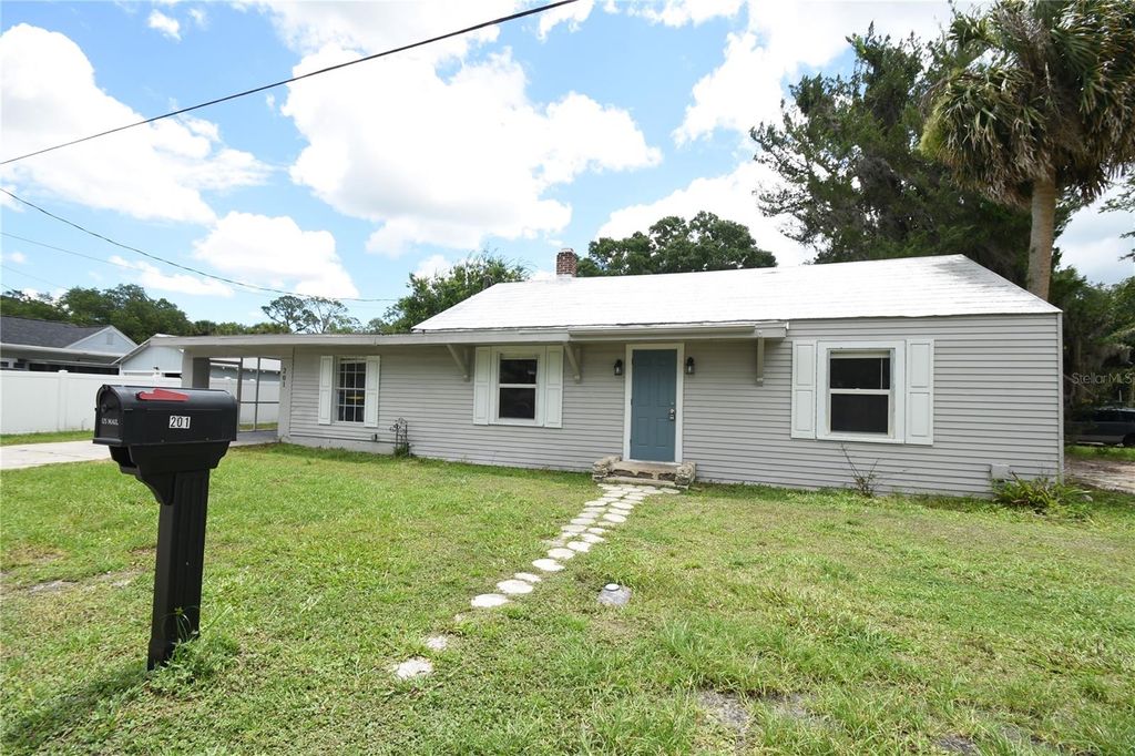 Photo of 201 E Palm Street, Bunnell, FL 32110 (MLS # FC319084)