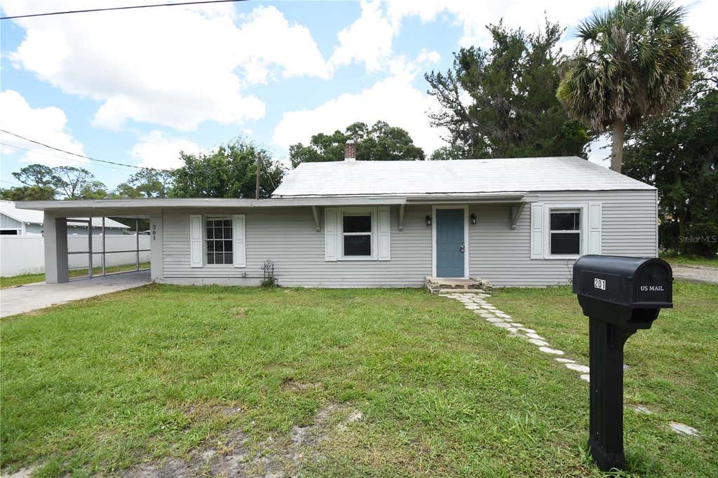Photo of 201 E Palm Street, Bunnell, FL 32110 (MLS # FC319084)
