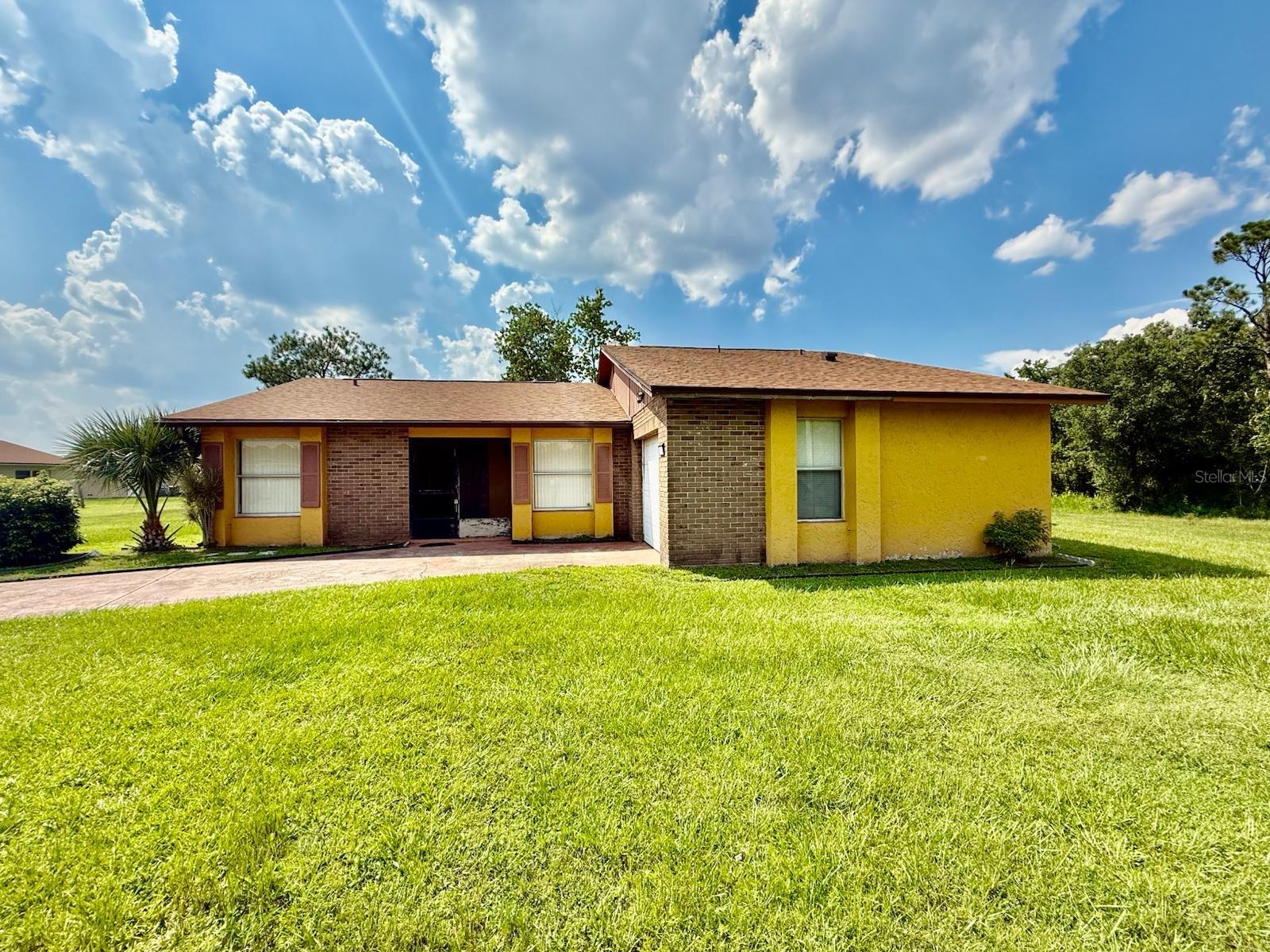 Welcome to this beautifully maintained 3-bedroom, 2-bathroom home offering 1,252 square feet of comfortable living space in the growing community of Poinciana. Perfect for first-time buyers, downsizers, or investors, this home features a spacious and functional layout designed for modern living.
Step inside to find a bright and airy open-concept living and dining area, ideal for both relaxing and entertaining. The kitchen offers ample cabinet space and a convenient layout, making meal prep a breeze. The primary suite includes a private en-suite bathroom, while the two additional bedrooms are well-sized and share a full guest bathroom.
Enjoy Florida living with a spacious backyard, perfect for family gatherings, gardening, or simply soaking up the sunshine. This home offers easy access to schools, shopping, dining, parks, and all the amenities of the Poinciana community.
