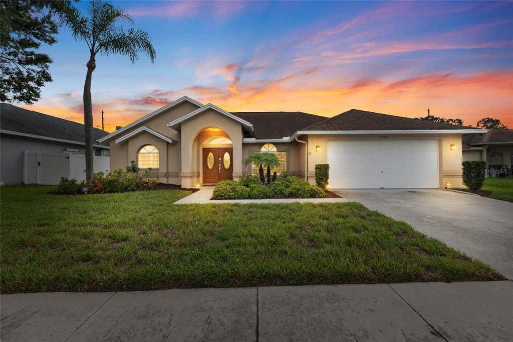 Photo of 22861 Sterling Manor Loop, Lutz, FL 33549 (MLS # TB8536464)