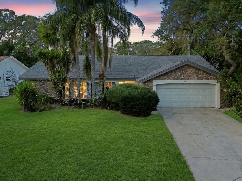 Photo of 8210 Clover Hill Loop, Hudson, FL 34667 (MLS # O6391926)