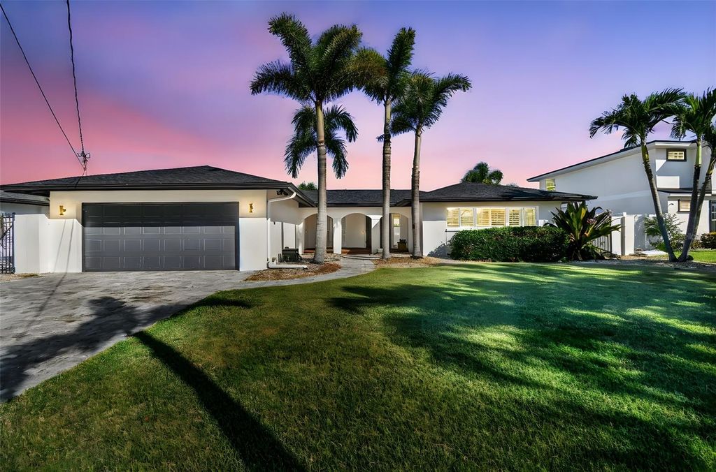 Photo of 320 Palm Island NE, Clearwater Beach, FL 33767 (MLS # TB8434339)