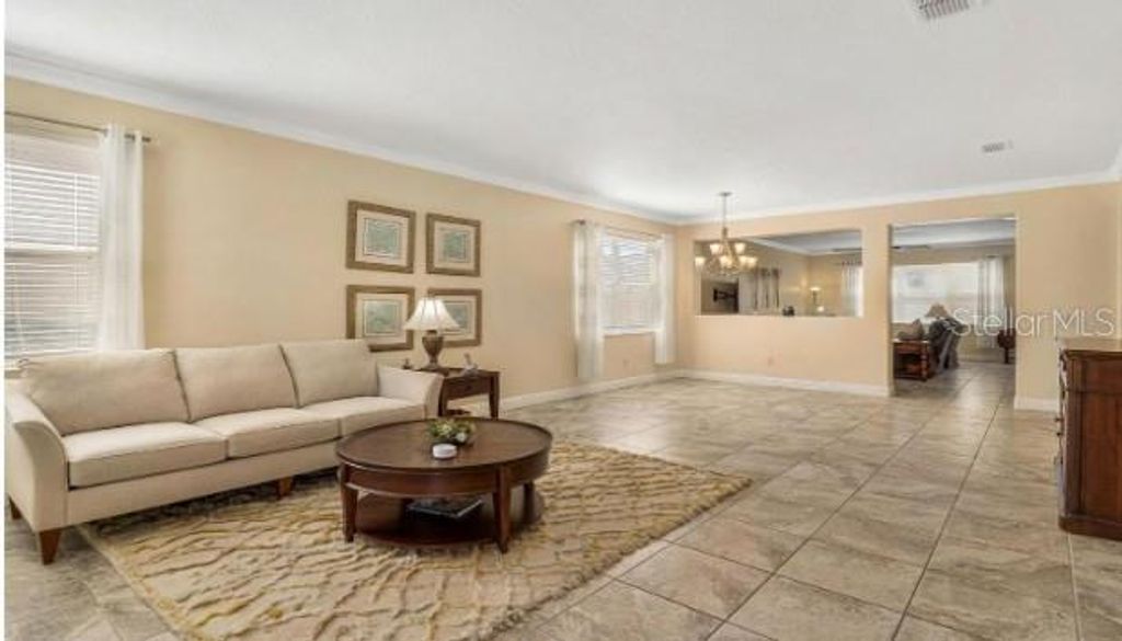 Photo of 530 Setting Sun Drive, Winter Garden, FL 34787 (MLS # O6398374)