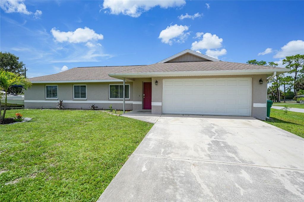 Photo of 590 Ridgewood Street NW, Port Charlotte, FL 33952 (MLS # D6127283)