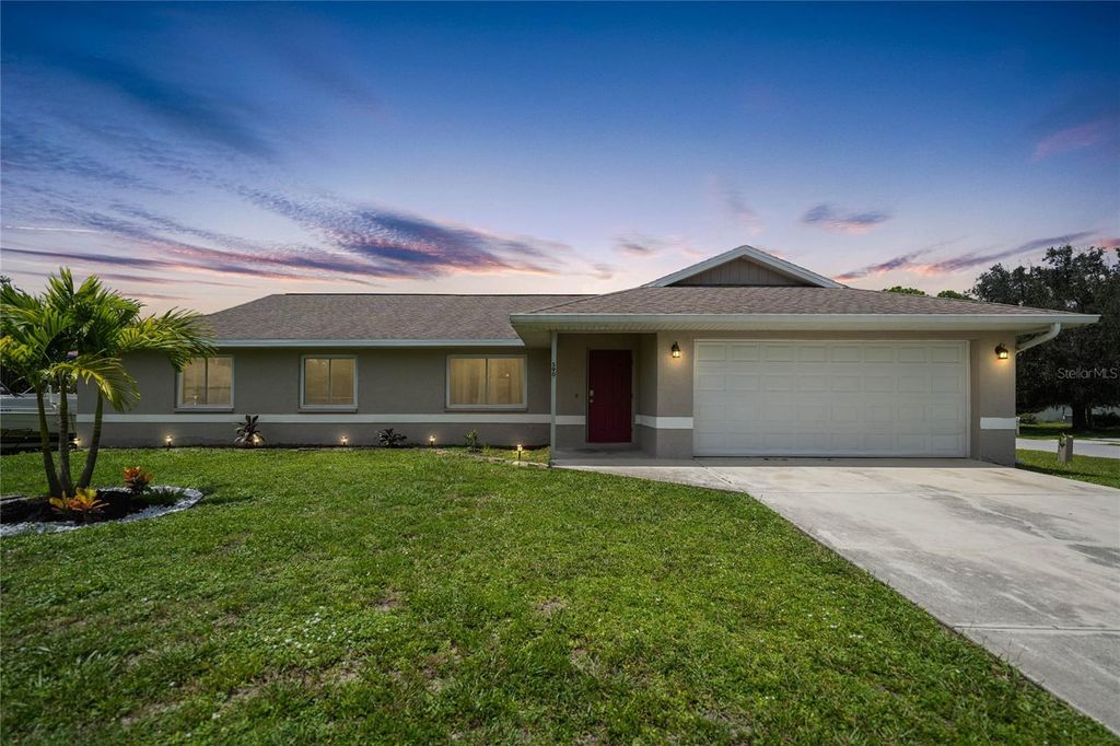 Photo of 590 Ridgewood Street NW, Port Charlotte, FL 33952 (MLS # D6127283)