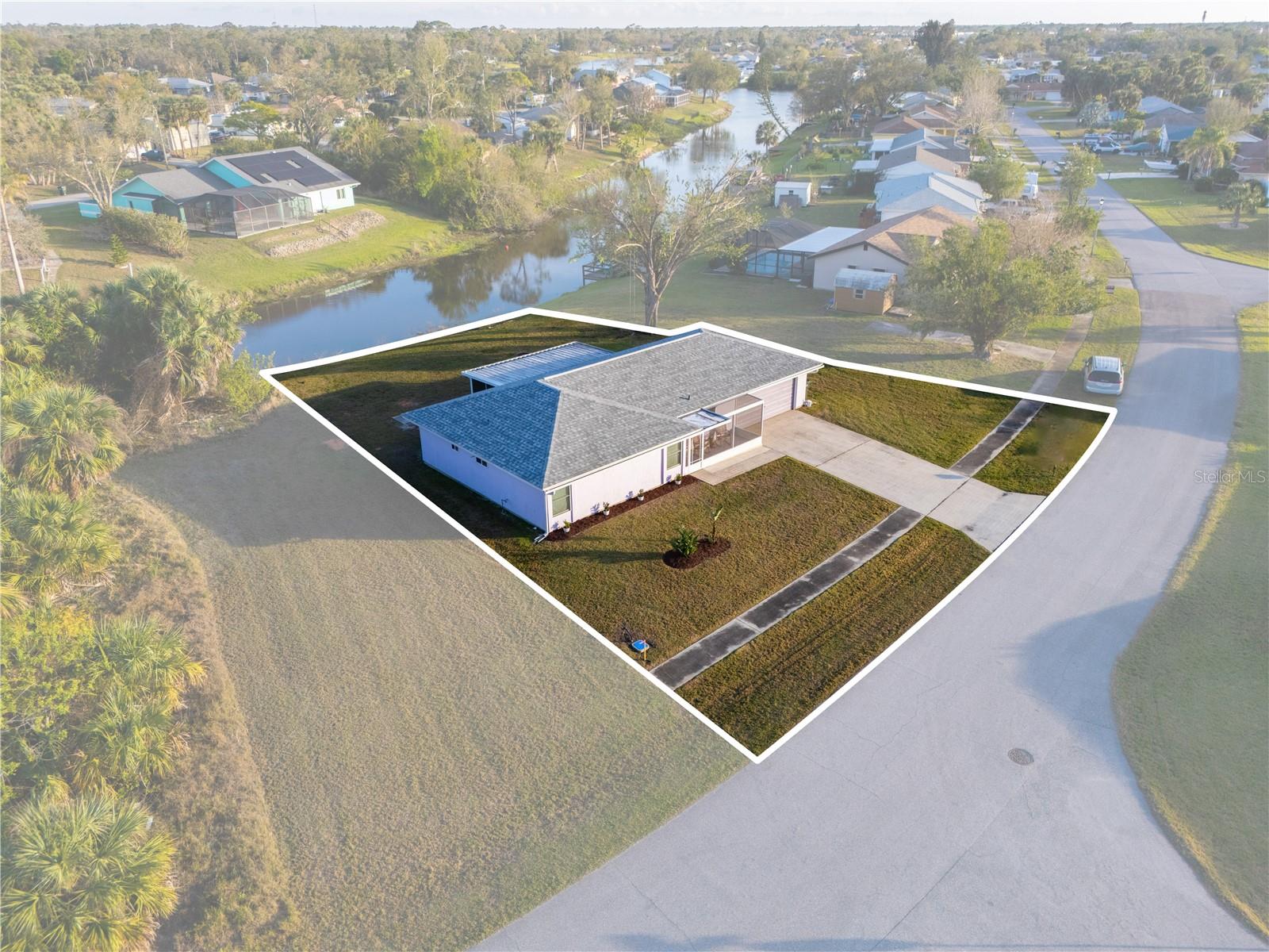 PRICE IMPROVEMENT! "Discover your perfect retreat at 3940 Abbottsford St in the heart of North Port! This charming single-family home sits on an expansive 11,315 sq ft lot, offering serene waterfront views along a city-managed canal. Ideal for a small family, this move-in-ready gem features a freshly remodeled kitchen with upgraded granite countertops and hardwood cabinets, complemented by beautifully updated bathrooms with new fixtures and an upgraded toilet. The open-concept floor plan showcases newly installed luxury vinyl floors, modern lighting, and updated ceiling fans throughout, creating a bright and inviting space. This home features a Newer Roof (2023) and has been fully inspected and upkept by a licensed inspector prior to listing.
Step outside to enjoy the peaceful canal setting or take a stroll along the paved sidewalk in this quiet, friendly, and developed neighborhood. Centrally located off Sumter Blvd and close to US 41, you’re just minutes from Coco Plum Shopping Center, the vibrant Wellen Park, top local schools, and everyday conveniences. Whether you're relaxing indoors or exploring the area, this cozy family home blends modern upgrades with small-town charm. Don’t miss your chance—schedule a showing today!"