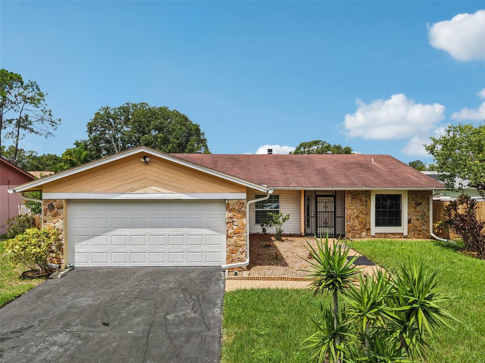 Welcome to Country Place! This charming 3-bedroom, 2-bath home has been lovingly maintained by the same owner for over 25 years. Enjoy peace of mind with low HOA fees and no CDD. Inside, you’ll find tile flooring throughout, a beautifully updated kitchen with granite countertops and stainless steel appliances, plus a spacious master suite. The oversized screened lanai offers multiple areas to relax, entertain, or even gather around a fire pit, and the fully fenced yard adds privacy and security. Perfectly located near A+ rated schools, Tampa International Airport, the VA Hospital, and endless dining and entertainment options — this is a must-see!