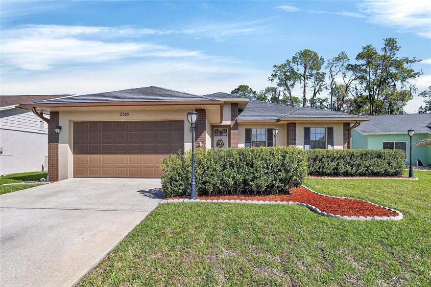 Nestled in a quiet, private enclave of Walden Lake, this beautifully maintained 3-bedroom, 2-bath home sits on a peaceful one-road loop with no backyard neighbors, offering privacy and a relaxed lifestyle. Built in 2001 by a respected local builder, this home has been lovingly cared for by its original owners. Recent updates provide peace of mind, including a steel shingle tile roof installed in 2014 (metal roofs typically last 40–70 years) and a new A/C system with updated ductwork in 2022. Upon entering, you will immediately notice the attention to care and detail, from the stained glass transoms above the doors to the chair rail accents and custom molding in the owner’s suite. The practical split-bedroom floor plan wastes no space and offers plenty of storage. The owner’s suite features double sinks and a tub/shower combination, and the spacious walk-in closet is currently used as an office or hobby area but can easily be converted back with closet rods. The family room fireplace creates a warm focal point and a cozy space for relaxing evenings. Bedrooms two and three share a convenient hall bath. Step outside to the screened lanai and pavered saltwater pool area with the pool resurfaced last year, perfect for enjoying quiet mornings, afternoon swims, or peaceful evenings with no backyard neighbors. This well-cared-for home offers comfortable, low-maintenance living in a serene setting within Walden Lake. Walden lake features miles of walking and biking trails, a lakefront park with a new playground, large and small dog parks, a sports complex and more. Historic Plant City has 4 exits off I 4 and is located for an easy commute in all directions! This home is being sold as-is with the right to inspect. Call today to schedule your in home tour!