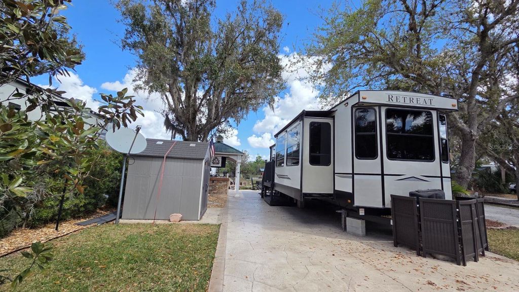 Photo of 431 Waterway Drive, River Ranch, FL 33867 (MLS # TB8480698)