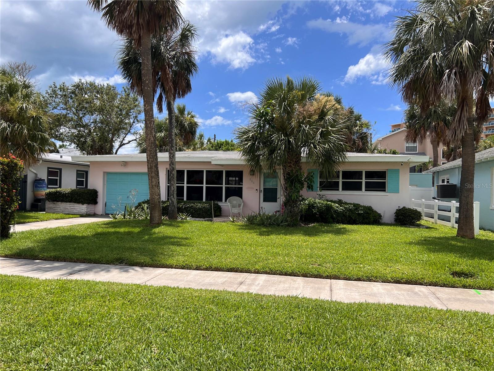 INCREDIBLE OPPORTUNITY!!!............. Just imagine; your own private, tropical oasis in this highly sought-after North Clearwater Beach Community. Just two short blocks from the Sugar Sand beaches, and minutes from the famed Pier 60, with great restaurants, seaside dining, live music festivals and shops!!!............. The house has a wonderful "beachy" cottage charm about it, and the rooms have a lovely, spacious feel to them. The layout of the house flows beautifully and gives you a truly comfortable living experience any time of day. Lots of lovely natural light from all sides. The backyard is totally private, and you'll enjoy hosting parties or bar-b-ques amidst this stunning, tropical, lush backdrop. Mature palm trees sway in the breeze and the maintenance is easy with the property's irrigation system! There's no doubt that every day feels like a Holiday while you're here and everything you need is just a few minutes away.............. Walk, Bike or take your Golf Cart into town to eat, shop, or take in the lively festivals. You'll adore how quick and easy it is to get to the sugary sands of the most beautiful beach in Florida. The neighborhood is very quiet and safe and the neighbors are always there to lend a hand if needed.............. There's plenty of extra room for a pool and a spa and because the home was not considered "substantially damaged" from the storm; you're able to make any repairs, build up a second level, or start completely new. The choice is yours to make your new beach retreat - the Paradise Home of Your Dreams. The home's latest architectural drawings and soil report are available.............. Life in this amazing golf cart community will provide you endless year-round coastal charm. This two-bedroom (actually could be a 3 bedroom; there is a closet), one bath open plan block home features mature tropical landscaping, an enclosed, covered back porch, a large living/family room and a formal dining room with closet and a one car - attached garage. The home sits on a larger lot; 6,700 square feet with a fully fenced back yard. A convenient, enclosed outdoor shower makes cleaning up after the beach quick and easy. The irrigation system keeps the property in pristine condition. And...there will be plenty of room for the pool of your dreams! There is NO HOA, and it is legally zoned for 30-day minimum rentals.............. The property experienced some flooding during Hurricane Helene and is being sold “AS-IS” but has been professionally and fully remediated and is ready for your Dream Home Concept! This incredible location, inherent charm and stellar investment opportunity remain unchanged. This is a one-of-a-kind, super opportunity to own a vacation retreat, lucrative investment property or your next fabulous home on the highly desirable North Clearwater Beach. Available today, at the lowest price in years. ACT FAST! This deal will not last long. Ready to make the dream your reality? This is your moment.