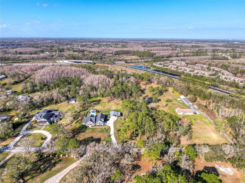 Photo of 6034 Lakeside Drive, Lutz, FL 33558 (MLS # TB8348488)