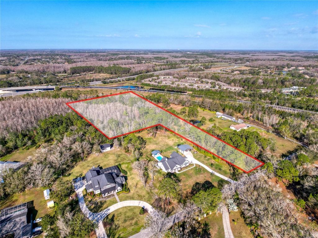 Photo of 6034 Lakeside Drive, Lutz, FL 33558 (MLS # TB8348488)