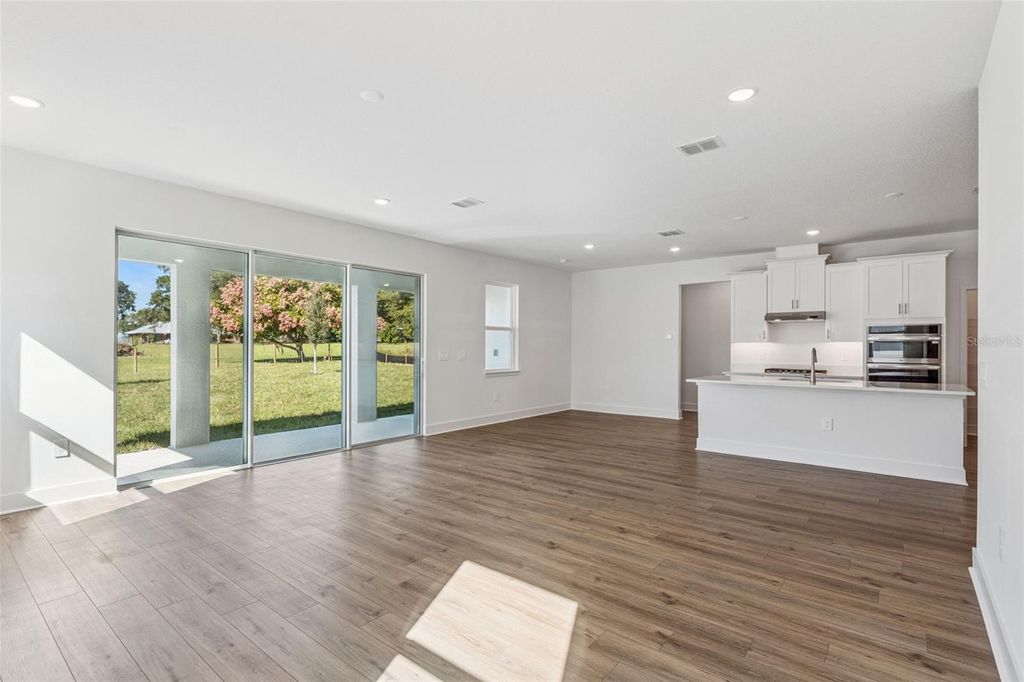 Photo of 574 Emerald Grove Drive, Apopka, FL 32703 (MLS # W7885475)