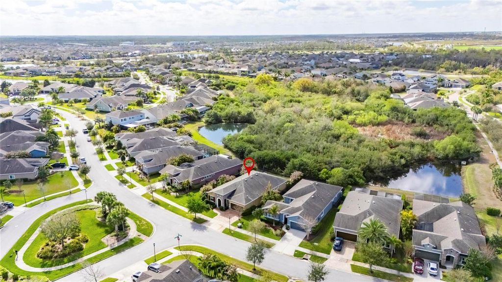 Photo of 6909 Crestpoint Drive, Apollo Beach, FL 33572 (MLS # TB8482659)