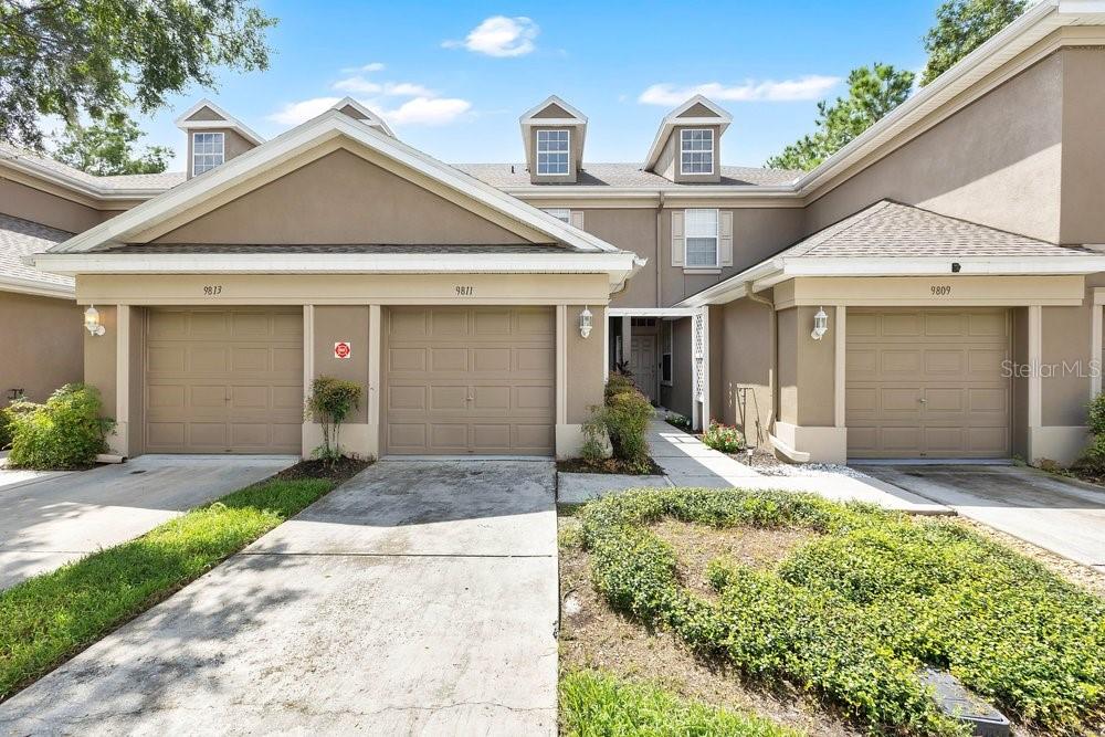 Photo of 9811 Fan Palm Way, Tampa, FL 33610 (MLS # O6443539)