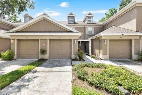Photo of 9811 Fan Palm Way, Tampa, FL 33610 (MLS # O6443539)