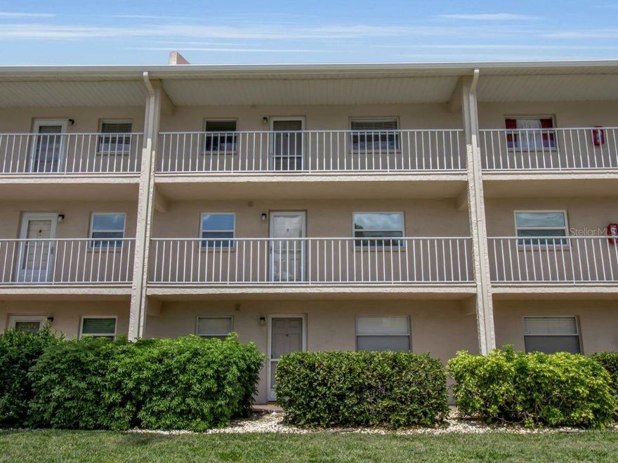 One or more photo(s) has been virtually staged. Welcome to 3987 Maceachen Blvd, Unit 133, an updated condo located in a desirable 55+ community in Sarasota. This 2-bedroom, 2-bathroom residence offers 978 square feet of living space with bamboo hardwood flooring throughout. The primary suite features a walk-in closet and an updated en-suite bathroom with a quartz vanity and tile walk-in shower. The guest bathroom has also been remodeled and includes a quartz vanity. The kitchen has been updated with quartz countertops, new cabinetry, a built-in sink with neck faucet, and canned recessed lighting. Enjoy the private terrace overlooking the community pool and park. The building includes elevator access for added convenience. The property is conveniently located near Publix, is approximately 6 miles to Siesta Key Beach, and 5 miles to downtown Sarasota, providing easy access to shopping, dining, and entertainment. This move-in-ready condo is suitable for full-time or seasonal living within a well-located Sarasota community.