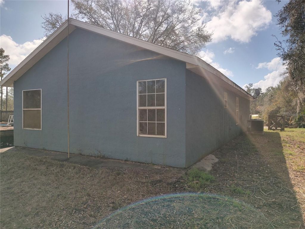 Photo of 1251 Seminole Drive, De Leon Springs, FL 32130 (MLS # FC316729)