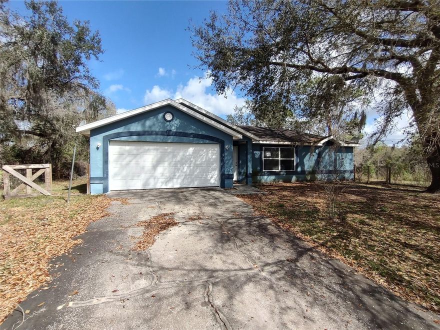 Here's your opportunity to get your own ranchette.  This home sits on 3.34 acres in unspoiled west Volusia County.  An existing 24x40 barn/carport will provide covered parking, workshop/storage space and even corral a horse or two.  While the home itself needs a refresh, the layout features split bedrooms, a large living/dining combo along with a spacious family room.  The woods to the back of the property are awaiting pretty much whatever you can imagine... or simply leave untouched. At home you will be free of the hustle & bustle, but the conveniences and charm of DeLand and Stetson University are a short drive.  Be at the beach in 45 minutes.  St John's River is even closer.  Hard to beat this location if you are looking for fresh country air.  Priced to sell.  Don't miss this one!