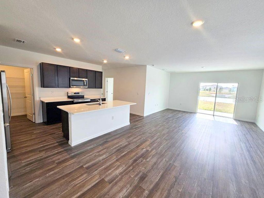 Photo of 32955 Osprey Peak Way, San Antonio, FL 33576 (MLS # TB8478038)