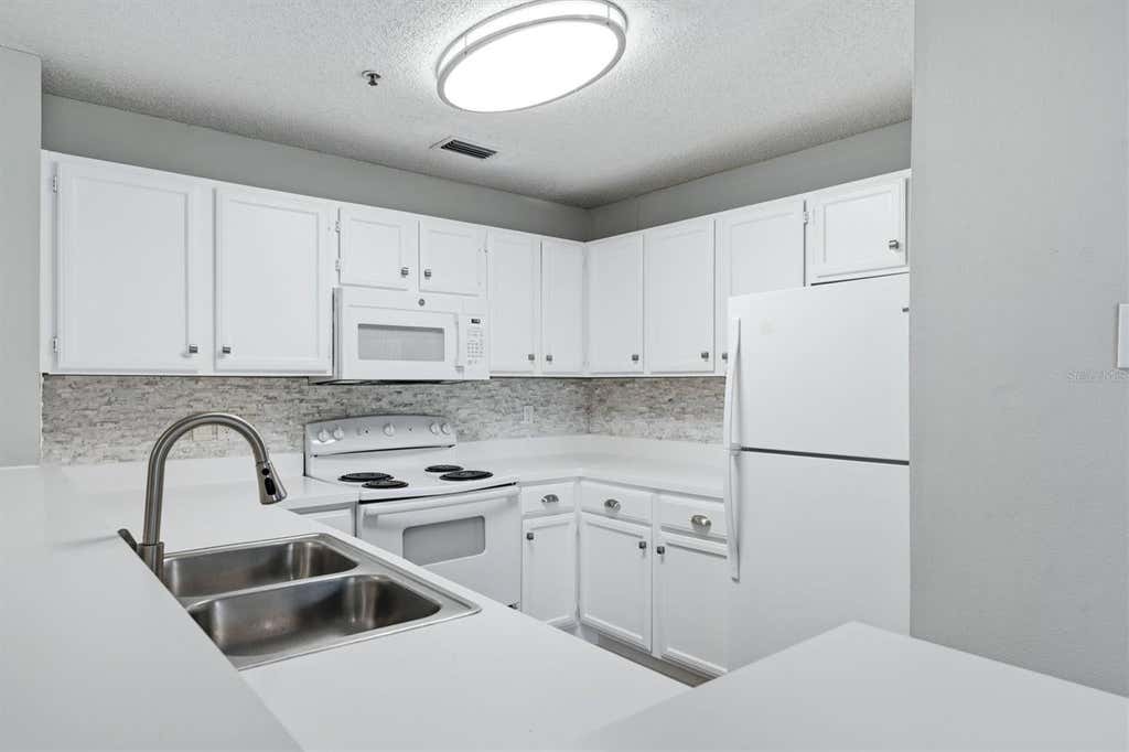Photo of 4057 Crockers Lake Boulevard #16, Sarasota, FL 34238 (MLS # A4701594)