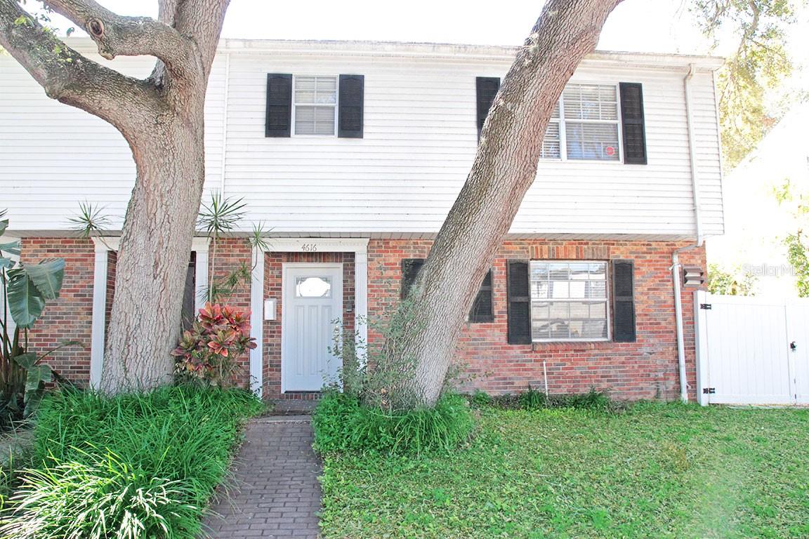 Beautifully remodeled Westshore townhome with tons of space and storage storage storage! Available February 1, possible January move-in TBD. 2.5+ car GARAGE with workshop area, private parking, FENCED yard, off-street parking, and trailer parking in South Tampa? WOW! Walking distance to Westshore mall, restaurants, Greenwise Publix, Panera, Starbucks and more! Inside you'll find a large kitchen with new appliances, a huge greatroom with dining area, downstairs rear bedroom, and a half-bath for visitors. Upstairs are two oversized bedrooms each with walk-in closet and private bath. Available fully furnished with tasteful coastal decor, and includes TVs, adjustable mattress, small kitchen appliances and more. Off street parking for your guests and a 2.5+ car garage with work-space for you, PLUS a huge side yard with room and privacy fence for a boat or trailer! A private fenced backyard makes this townhome a stand-out in the downtown area. Great for entertaining or a short drive home from work each day. Enjoy South Tampa living and it's A-rated schools, and easy access to downtown, interstates, and airport. Walk to fine dining, upscale shopping at two nearby malls, or a short drive to major sports arenas. No HOA or association fees. Pets with approval and separate pet deposit. Tenant responsible for utilities and lawn care. $3000 security deposit.