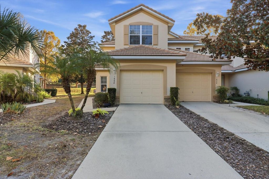 Photo of 1668 W Spring Meadow Loop, Lecanto, FL 34461 (MLS # TB8513518)