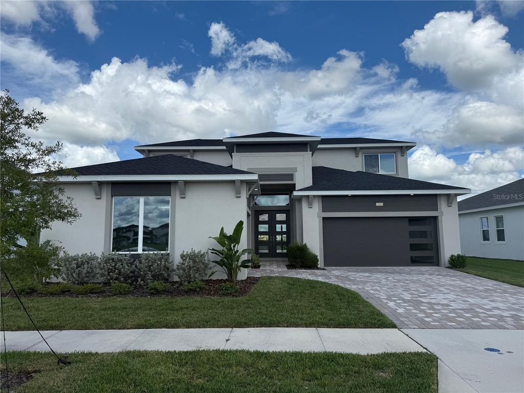 Photo of 10661 Torchwood Sea Way, San Antonio, FL 33576 (MLS # J993124)