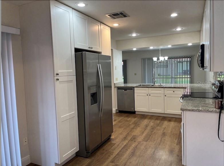 This nice gated community is nestled in the heart of Dr. Phillips area. This 3 bedroom, 2.5 bathroom home offers a perfect mix of comfort and convenience. The clubhouse offers heated pool, gym and 2 tennis court.