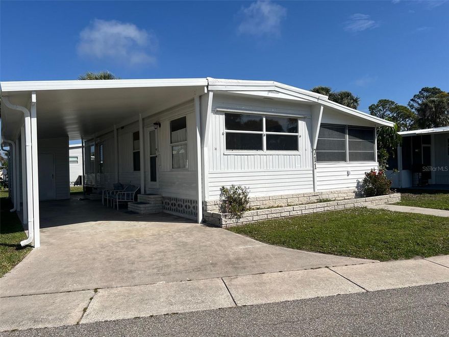 What a great opportunity for someone looking for a winter retreat! or affordable living. Brand new carport.  A one- bedroom, one-bathroom, (but additional sleeping area) in the well maintained community of Japanese Gardens, located a mile from Manasota  Beach.  The asking price of 99,000 is barely above the cost of the lot alone and the potential for transformation allows for personal touches and customization.  Whether for seasonal living or an in investment, this home will attract those seeking a cozy getaway for winter or an  affordable home in "Paradise".  The folks living in Japanese Gardens are among the nicest, most friendly you could ever hope to meet and the pool clubhouse is the perfect place to connect.