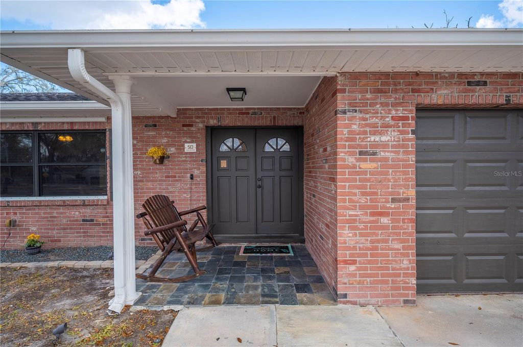 Photo of 513 Queens Loop N, Lakeland, FL 33803 (MLS # L4959446)