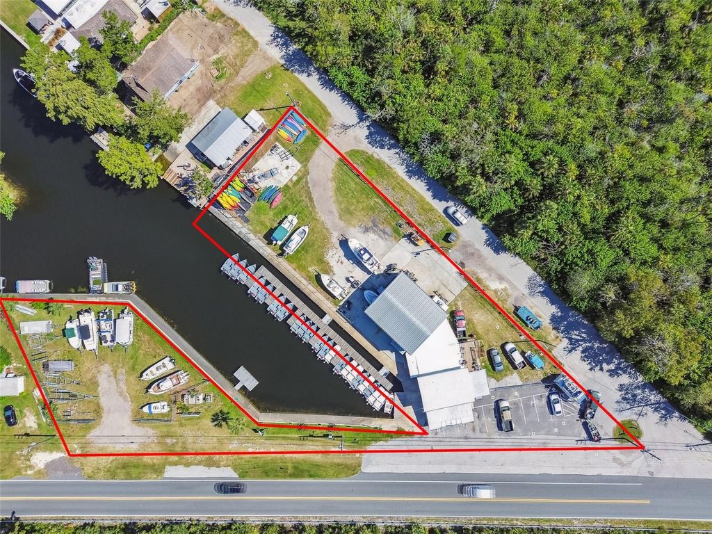 Photo of 7154 Shoal Line Boulevard, Weeki Wachee, FL 34607 (MLS # TB8426800)