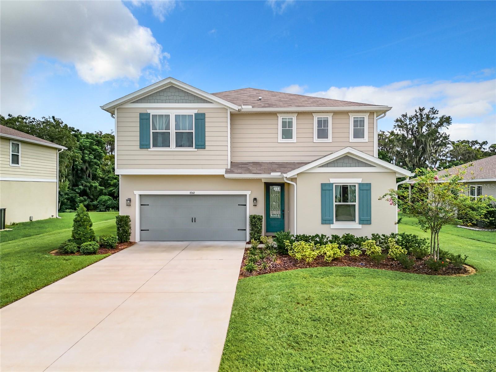 Step into spacious elegance at 8060 Cherrystone St in Leesburg, FL—a stunning 5-bedroom, 3-bath home offering over 2,700 square feet of modern comfort. Built in 2021 and thoughtfully designed with high ceilings, quartz countertops, and soft-close cabinetry, this home features an open-concept layout perfect for entertaining. The gourmet kitchen flows seamlessly into the dining and living areas, while the upstairs loft provides a flexible space for relaxation or play. Enjoy the privacy of no rear neighbors from your covered patio, and retreat to a luxurious primary suite with a custom walk-in closet and spa-like bath. With a two-car garage, upstairs laundry, and proximity to Lake County’s waterways, shopping, and major highways, this move-in-ready home blends convenience with tranquility. Schedule your tour today!
