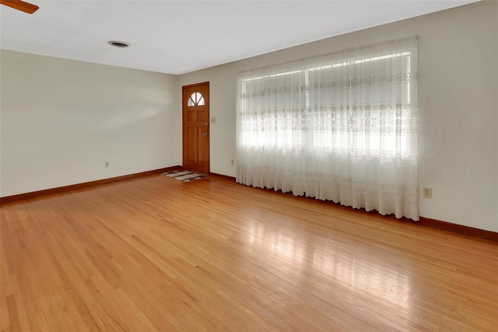 Photo of 717 E Grove Place, Deland, FL 32724 (MLS # V4945250)