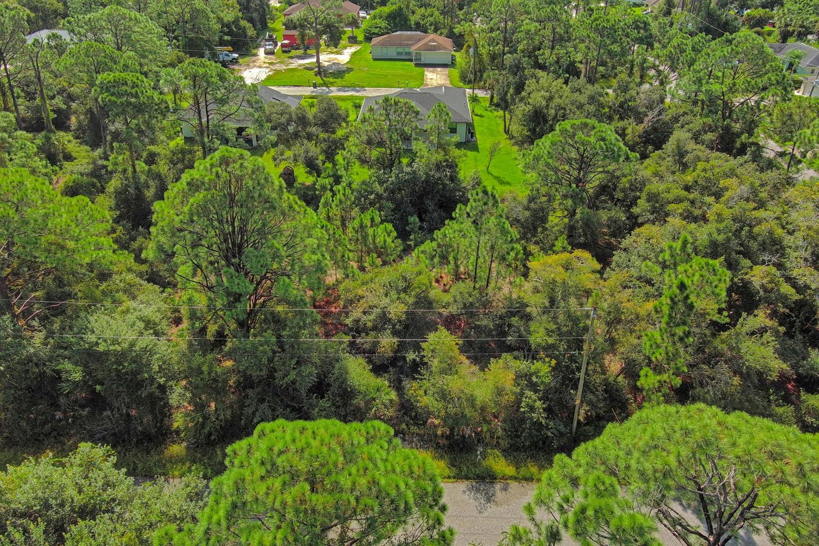 Exclusively listed by Sunland Real Estate: This centrally located 0.23-acre lot in North Port, Florida, is high and dry with no flood zone. A well developed neighborhood that is conveniently close to I-75 and major roads, it offers the perfect location for your next home. North Port, FL is a rapidly growing city known for its family-friendly atmosphere, proximity to Gulf Coast beaches, and easy access to both Sarasota and Fort Myers. The city also offers a variety of outdoor recreational activities, including hiking, golfing, and access to Warm Mineral Springs.