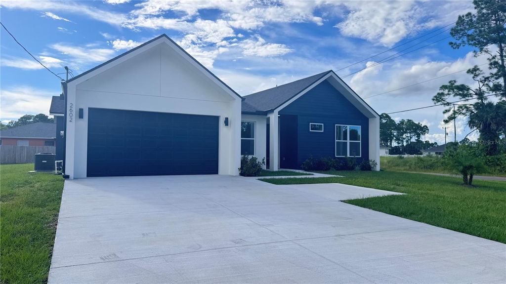 Photo of 2602 De Groodt Road SW, Palm Bay, FL 32908 (MLS # O6348450)