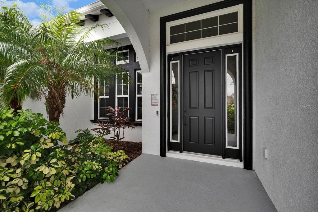 Photo of 6927 Crestpoint Drive, Apollo Beach, FL 33572 (MLS # TB8409402)