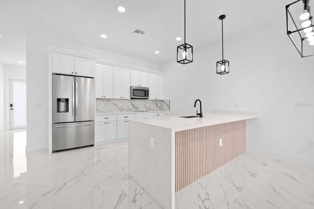 Photo of 2117 Andalusia Boulevard, Cape Coral, FL 33909 (MLS # A4680560)