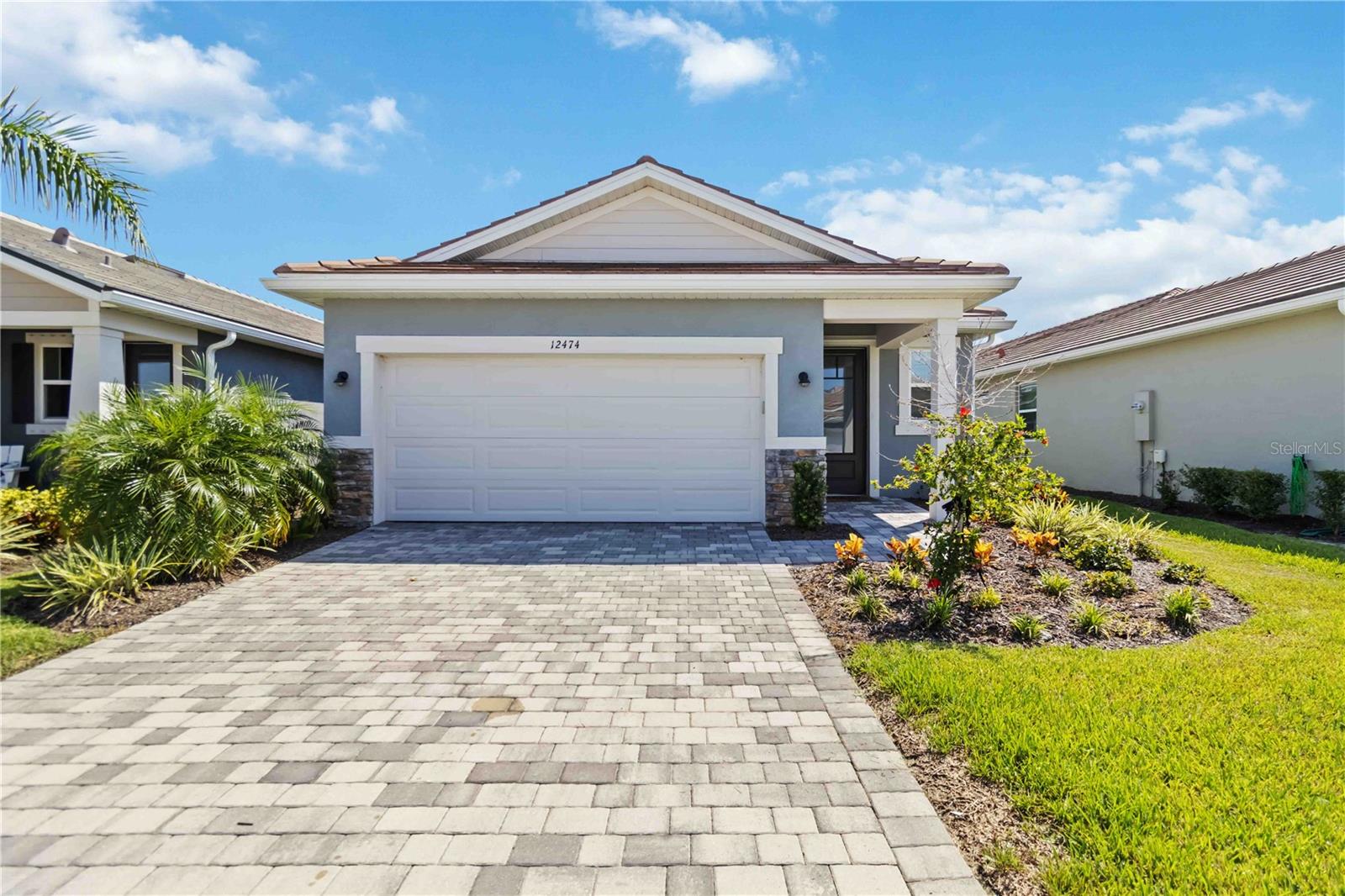Better Than New Construction! No Wait, No Punch List! Welcome to 12474 Somatic Court, a beautifully upgraded Pelican model located on a quiet cul-de-sac in the heart of Sunstone Village at Wellen Park, one of Southwest Florida's newest and most vibrant gated communities.
This thoughtfully designed 3-bedroom, 2.5-bath single-story home offers 1,798 sq ft of stylish living space with peaceful preserve views---no flood insurance required. The open-concept floor plan flows seamlessly from the inviting front porch through the spacious great room and kitchen to the screened-in lanai, perfect for entertaining or relaxing.
The chef-inspired kitchen features a large center island, walk-in pantry, and sleek, modern finishes that combine both function and everyday elegance. The owner's suite is a private retreat, offering a luxurious walk-in shower, dual vanities, and a fully customized walk-in closet---complemented by upgraded tile flooring throughout the bedroom and closet. You'll find exceptional storage throughout, including a walk-in coat closet in the entry hall and a secondary bedroom with its own walk-in closet.
Seller post-build upgrades include: Epoxy-coated garage floor, Screened-in lanai, Custom walk-in closet in primary bedroom, Tiled floors in master bedroom and closet, Tiled TV nook and entrance hallway, 8 ft doors, designer lighting fixtures, and ceiling fans in every room all enhancing comfort and visual appeal.
Sunstone Village offers resort-style amenities including pickleball courts, a fitness center, event clubhouse, tot lot, dog park and a resort-style pool. As a resident, you'll also have access to a second amenity center at Sunstone Lakeside, currently under development.
Ideally located just minutes from Downtown Wellen Park, CoolToday Park, and the pristine Gulf beaches of Venice and Manasota Key, this move-in ready home offers the
ultimate Florida lifestyle without the wait and without flood zone worries. Don't miss your chance to be part of SWFL's premier master-planned community -- Wellen Park.