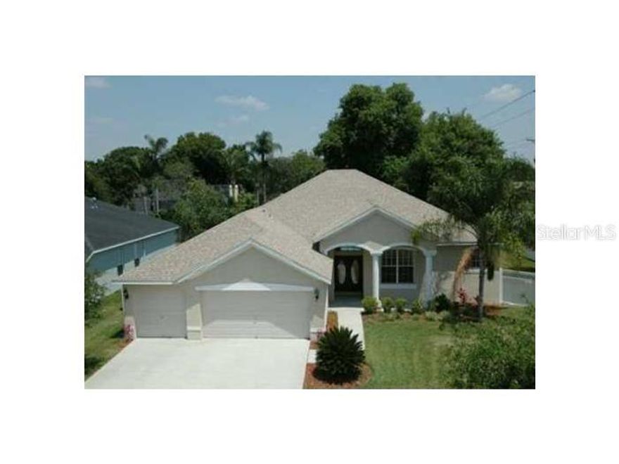VALRICO POOL HOME - 4 bedroom, 3 bathroom home with office, 3-car garage, and over 2,500 square feet in Valrico’s Duncan Groves, offering a true three-way split floor plan, and no CDD with low HOA. Set on a third-acre homesite in Flood Zone X, with the ideal combination of space, privacy, and long-term value. Enter through double glass doors with an immediate view of the pool and formal dining and flex space to the right & left of the entry, soaring ceilings, natural light, extensive crown molding, and surround sound. Inside, tile flooring creates a seamless flow through the main living areas, complemented by abundant natural light, and a multi-generational layout. The kitchen is timeless and positioned at the center of the home with features including granite countertops, 42-inch custom cabinetry with crown molding, stainless steel appliances, undermount sink, breakfast bar, extended seating, and an eat-in dining area overlooking the family room and pool. The adjacent great room offers recessed lighting, ceiling fan, three-panel sliding glass doors that open to your Florida Lifestyle! The primary suite is a private retreat with a spacious sitting area, tray ceilings with access to the lanai, and large walk-in closet. The en-suite bathroom includes dual vanities, a garden soaking tub, walk-in shower, and a private water closet with natural light. Bedrooms two and three are positioned in their own wing and share a full bath.  Bedroom four is ideal for guests offering direct pool access and proximity to a full pool bath with walk-in shower. A flex space located at the rear is well-suited for a home office.   The extended covered screened lanai includes dual ceiling fans and overlooks the saltwater solar heated pool with sun shelf and spa, and the oversized back yard. The over sized lot is fully fenced with an 8-foot privacy fence at the rear of the property.   Major updates include a new roof in 2024 and HVAC system in 2019.  The three-car garage is enhanced with insulated doors and built in electric car charger.  Located in Duncan Groves, residents benefit from larger homesites, low HOA, no CDD fees, and access to a community irrigation well. Highly desirable Valrico LOCATION with convenient access to major roadways including I-75, I-4, Selmon Expressway, and nearby shopping, dining, nature parks, restaurants and all that Tampa Bay has to offer. Rare opportunity to own a move-in ready POOL home with, functional floor plan, and location!