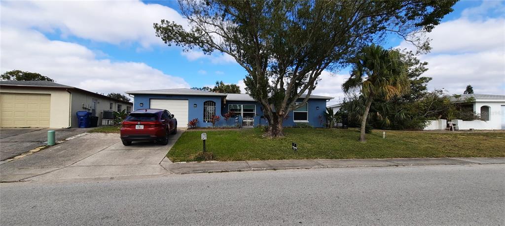 Back on the market. Buyers financing did not work out. Beautifully and meticulously remodeled home. Roof was done 2020, water heater was replaced 2020 and the home has a brand new pool pump. AS you walk up to the home you are greeted by gorgeous court yard, in the home your greeted with an oversized living room, new floors through out the home. The kitchen has been remodeled with stainless steel appliances, new cabinets, granite counter tops, the kitchen also has an oversized island with a breakfast bar on one side and storage cabinets on the opposite side. From your living room you can gaze at the gorgeous screened in lanai and pool area and Lake Janean. The yard also has a grilling area with granite counter tops. The home also has an all home surge protector, a water softener with a carbon filter, there is a yard irrigation system that uses the water from the lake. This home is a must see.