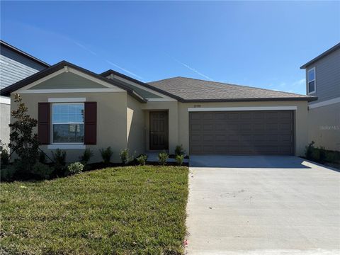 Photo of 22588 Nebula Way, Land O Lakes, FL 34638 (MLS # J997494)