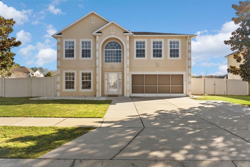Welcome to a home that truly lives large—inside and out. Set on an impressive .34-acre corner lot, this sprawling residence is one of the largest homes with one of the biggest lots in the neighborhood, offering room to spread out, entertain, and live comfortably for years to come. From the moment you step into the two-story foyer and living room, the sense of openness is undeniable, with soaring ceilings that set the tone for the generous layout throughout.
The first floor offers incredible flexibility, including an extra-spacious bedroom and the potential for an in-law or multi-generational living setup. Upstairs, a bright bonus office or loft overlooks the living area through thoughtfully added windows—maintaining the open feel while creating a perfect space for work, play, or relaxation. Storage is abundant at every turn—this home was designed with space in mind.
At the heart of the home is a gourmet kitchen built for entertaining, complete with double ovens, a gas stove, TWO refrigerators, large decorative tile, a cozy dinette area, and a separate formal dining room for hosting memorable gatherings. Upstairs, the primary suite is a true retreat, featuring an en-suite layout that flows into a large bathroom and two separate walk-in closets—plenty of room for all your Florida lifestyle essentials, especially when you’re living near the Chain of Lakes.
Now let’s talk about the backyard—because this is where the fun happens. Fully fenced, beautifully spacious, and rarely found at this size, the outdoor area offers endless possibilities: gatherings, play, pets, gardening, or simply enjoying the Florida sunshine. The screened-in lanai is perfect for year-round relaxation or entertaining, while the extended concrete patio expands your outdoor living space even further. This is the kind of backyard that invites memories.
Additional highlights include a newer upstairs A/C (2024), epoxy garage floors, and thoughtful upgrades throughout. Located in a quiet neighborhood, you’re just minutes from the beauty of Venetian Gardens, nestled between Lake Harris and Lake Griffin, and close to everything Leesburg has to offer. Enjoy a charming downtown filled with local restaurants and shops, easy access to US-441 and US-27, proximity to Sleepy Hollow Sports Complex, Leesburg Hospital, Lake Square Mall, and nearby colleges including Lake-Sumter State College and Beacon College.
Whether your lifestyle calls for space, convenience, entertaining, or simply room to breathe—this home delivers it all. Plenty of room, plenty to do, and a location that truly connects you to the best of Leesburg living.