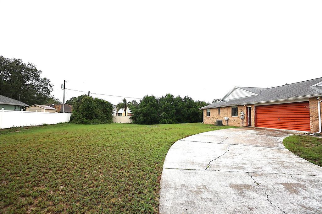 Photo of 918 N Atmore Circle, Deltona, FL 32725 (MLS # O6350288)